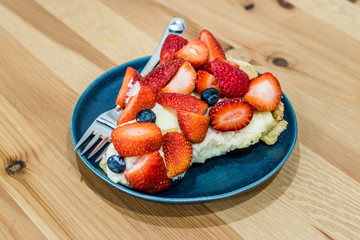 Strawberry Tart Pie Slice with Full of Strawberries in Plate.