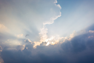 Naklejka na ściany i meble cloudy sky before thunderstorm with color from sunlight