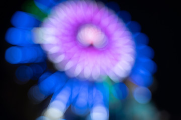 Abstract Bokeh of  Ferris wheel at Amusement park