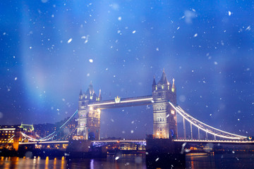 Fototapeta na wymiar Famous Tower Bridge in snowfall, London, England