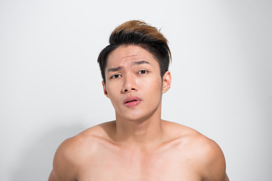 shirtless muscular young asian man