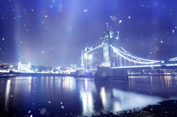 Fototapeta na wymiar Famous Tower Bridge in snowfall, London, England