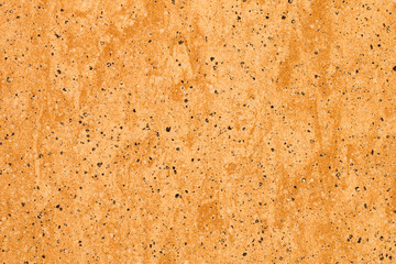 Closeup surface of granite orange tiles. Abstract, trendy, modern, texture background. An element...