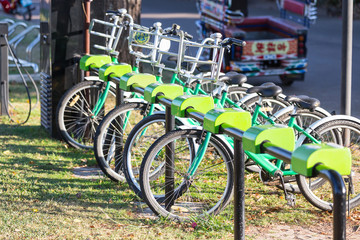 Row of city bikes for rent at docking stations