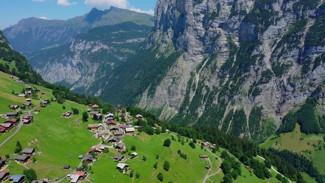 Small village of Gimmelwald in the Swiss mountains - Switzerland from above - aerial photography