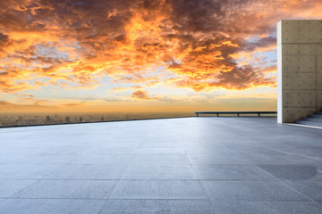 Empty floor and city skyline with beautiful clouds scenery in Shanghai at sunset.high angle view.