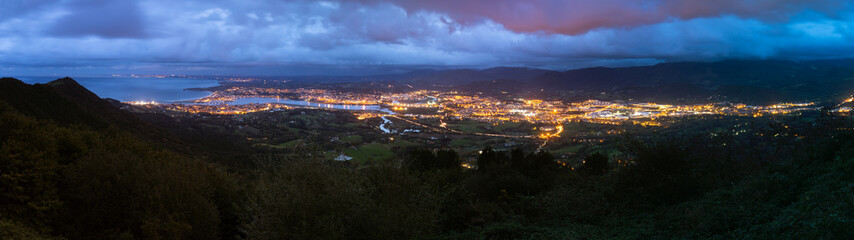 View from Txingudi bay with the mouth of Bidasoa river between Irun, Hondarribia and Hendaia at the Basque Country.