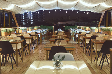 interior details of restaurant on the ship. Concept of interior design of a restaurant on a ship