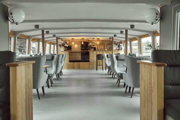 interior details of restaurant on the ship. Concept of interior design of a restaurant on a ship
