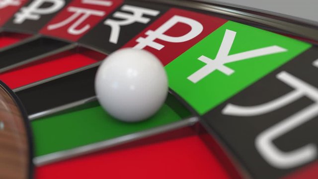 Ball in yen sign pocket on casino roulette wheel. Conceptual 3D animation