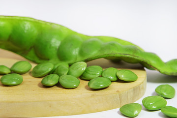 petai or bitter beans  on cutting board background