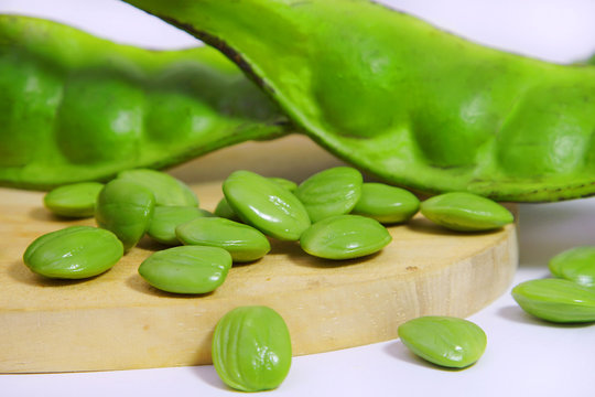 petai or bitter beans  on cutting board background