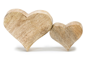 Two wooden hearts on white