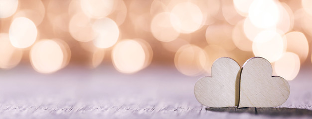 Fototapeta premium Two hearts on bokeh background