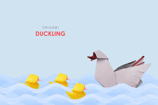 Illustration of folded paper models duck family swiming