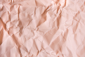 Rumpled beige background. Real texture of the wrapping texture.