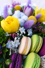  Flowers and colorful macaroons cakes as a gift