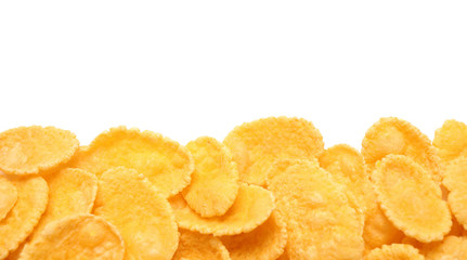 Tasty crispy corn flakes isolated on white