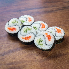 Japanese rolls for menu Photo on wooden table