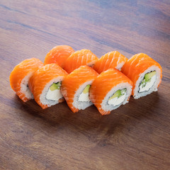 Japanese rolls for menu Photo on wooden table