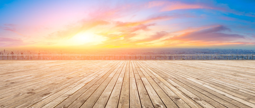 Wooden square and city skyline with buildings in Shanghai,China.