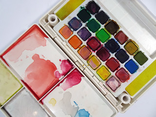 A palette of watercolor paints