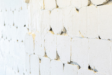 Rough old white wall with cracks for a background