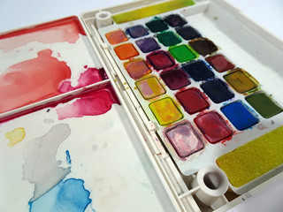 A palette of watercolor paints