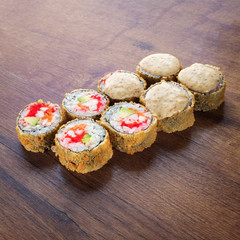 Japanese rolls for menu Photo on wooden table