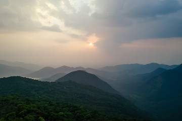 Obraz na płótnie Canvas nice photo with clouds ,sun ans hills in maharashtra karnataka states in India