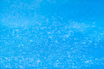 Obraz premium Empty swimming pool on a rainy day.
