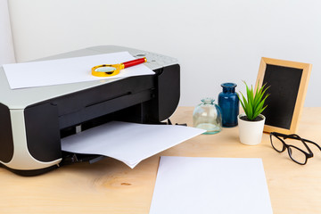 Office printer close up on a wooden table