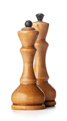 Wooden chess pieces close up isolated on white