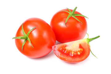 fresh tomatoes with slices isolated on white background