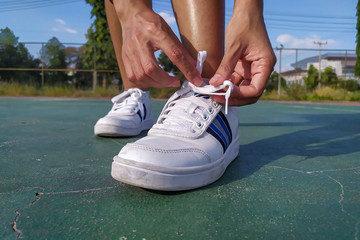 Wearing shoes for jogging on the field