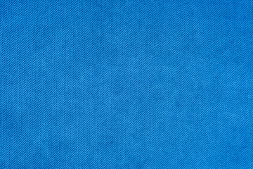 Obraz premium Blue texture of fabric from a textile material