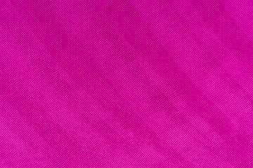Magenta colored fabric. Cloth background. 