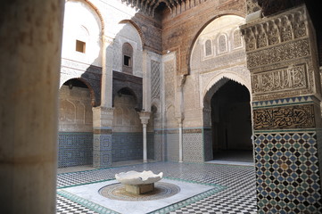 The Al-Attarine Madrasa is a madrasa in Fes, Morocco, near the Al-Qarawiyyin. It was built by the Marinid sultan Uthman II Abu Said in 1323-5. The madrasa takes its name from the Souk al-Attarine