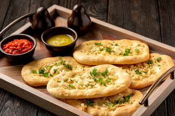 Homemade naan bread with garlic and butter.
