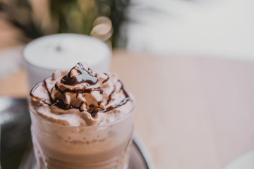 chocolate cocktail with ice cream. morning coffee, Breakfast in a cozy cafe near the window