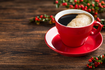 Delicious brazilian arabica coffee in red cup with berries