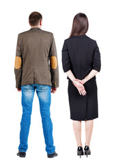 Back view of couple. beautiful friendly girl and guy together.