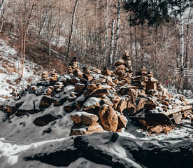  pile of stones in the winter forest