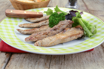 duck breast cooked and cut on a white background