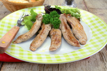 duck breast cooked and cut on a white background