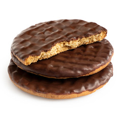 Stack of two and half dark chocolate coated digestive biscuits isolated on white.