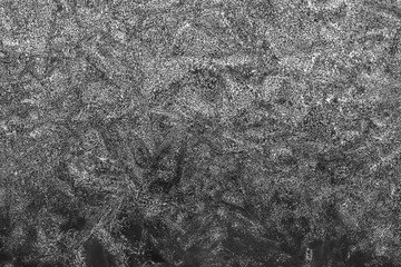 black and white decorative plaster background, dark gray stucco wall with copyspace , abstract...