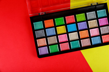 Colorful makeup palette, eye shadow in box.