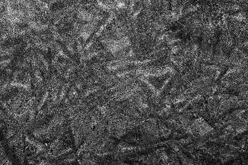 black and white decorative plaster background, dark gray stucco wall with copyspace , abstract wallpaper close up ,  ice macro, frozen winter texture