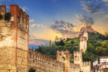 Medieval Castle of Soave in the province of Verona at sunset, Italy - obrazy, fototapety, plakaty